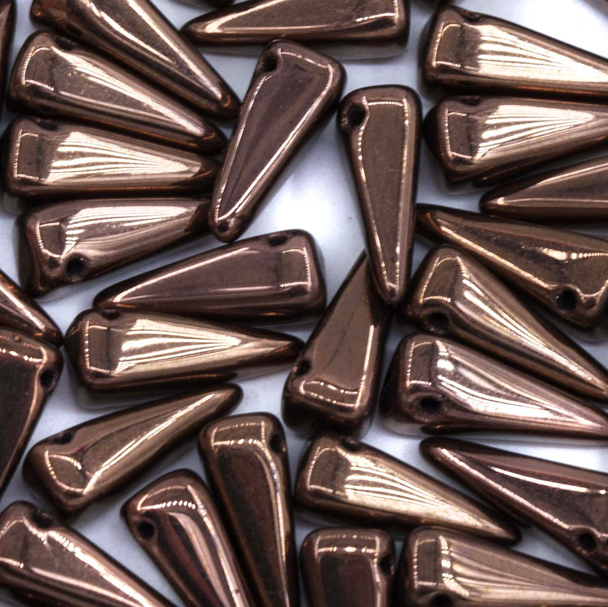 13DP556-C: Preciosa Ornela 6x13mm Jet Black Opaque Bronze Villa Beads