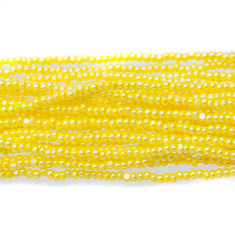 13SB326-CR: CZ Seed Bead Charlotte Sfinx Yellow 13/0 - 1 Hank