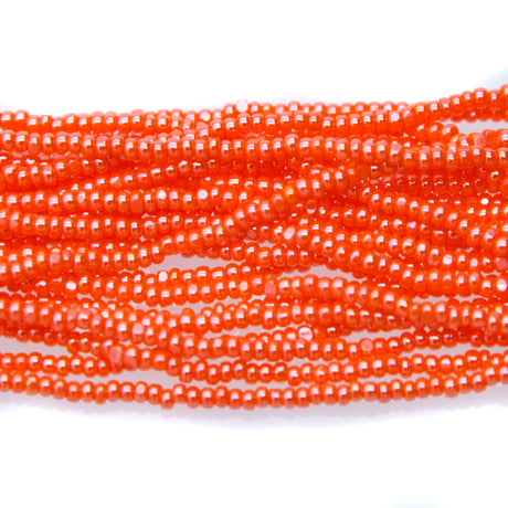 13SB334-CR: CZ Seed Bead Charlotte Sfinx Orange 13/0 - 1 Hank
