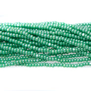 13SB384-CR: CZ Seed Bead Charlotte Sfinx Green 13/0 - 1HK
