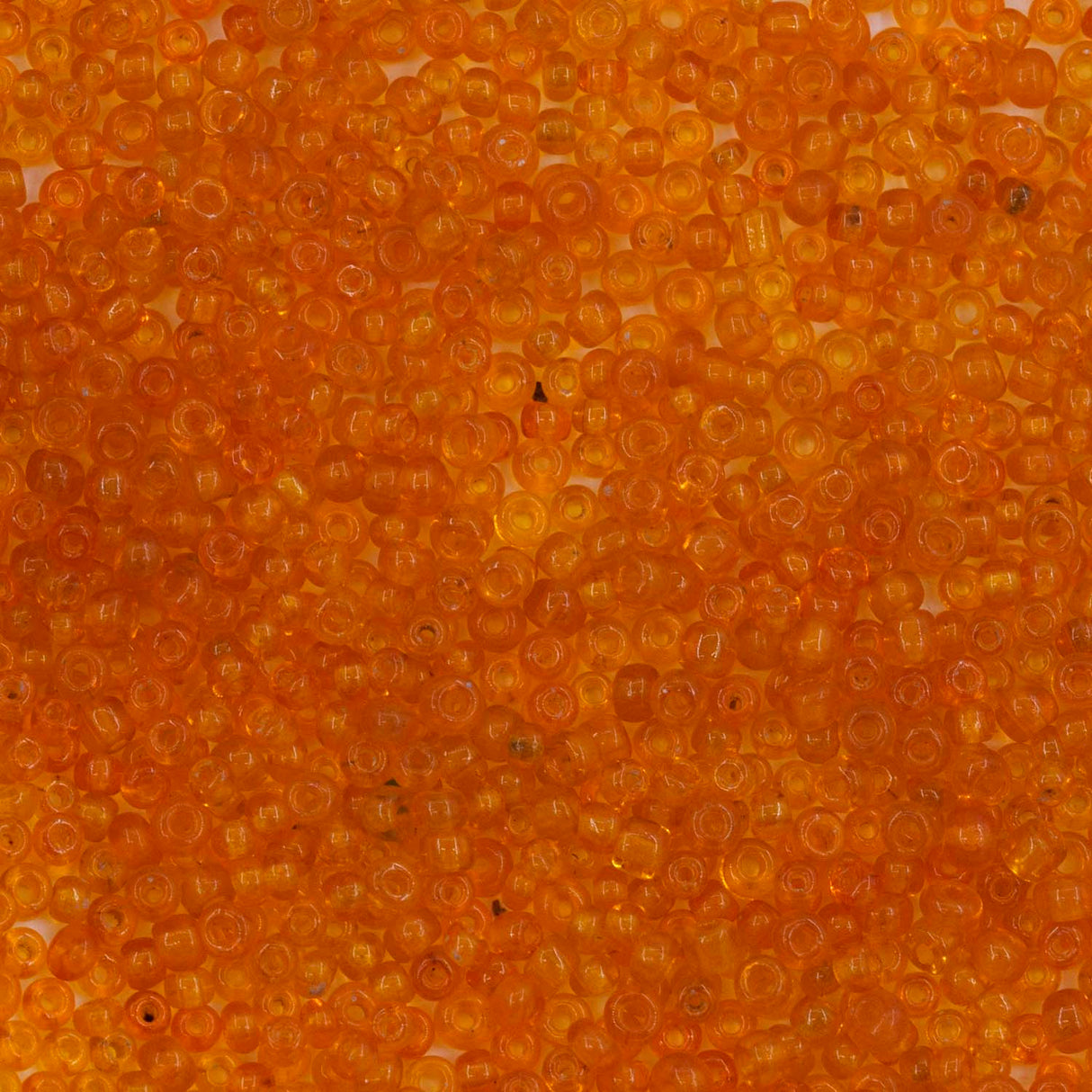13SV237-5: Antique Venetian 13/0 Seed Bead Transparent Orange #5 - 10 Grams