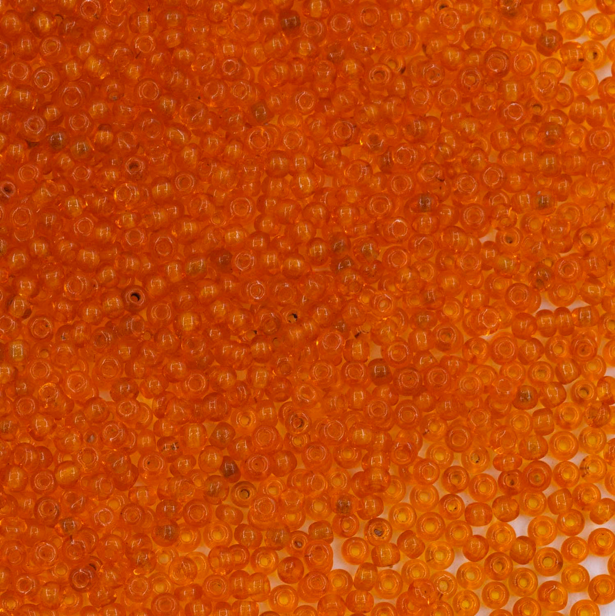 14SV236-4: Antique Venetian 14/0 Seed Bead Transparent Orange #4 - 10 Grams