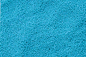15SB185-CL: CZ Seed Bead True Cut Turquoise Green 15/0 100GM