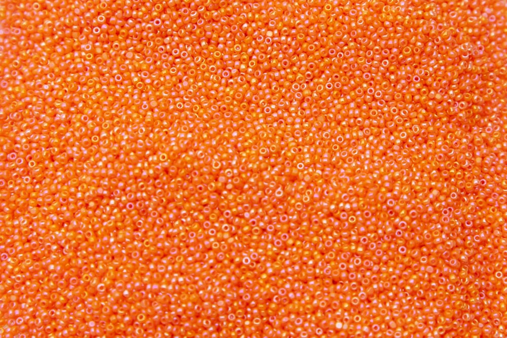 15SB534-CL: CZ Seed Bead True Cut Orange AB 15/0 100GM