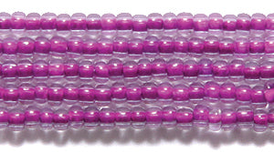 10SB798-N: CZ Seed Bead Neon Lined Purple 10/0 Uv Reactive 5HK