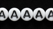 6LB-A: CZ Alphabet A White/black 6mm 300PC