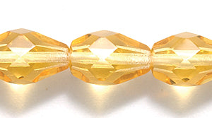 46FC253R: CZ Faceted Drop Trans Topaz 7x10mm-25PC