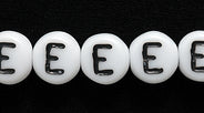 6LB-ER: CZ Alphabet E White/black 6mm-50PC