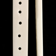 99LC112-8: Bone Choker Spacers 8 Hole 10x53mm Average 15 Pieces