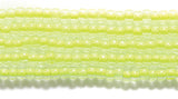 11SB723-NR: CZ Seed Bead Neon Lined Yellow 11/0 Uv Reactive-1HK