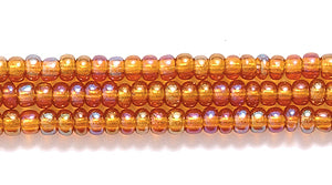 11SB556-TR: CZ Seed Bead Trans DK Topaz AB 11/0-1HK