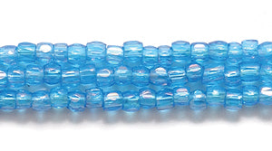 9SC566-TR: CZ Seed Bead 3-cut Trans DK Aqua Blue AB 9/0-1HK