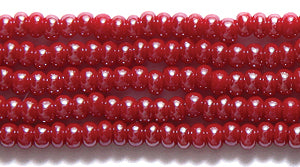10SB346R: CZ Seed Bead Sfinx DK Red 10/0-1HK