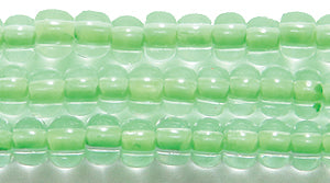 6SB784-NR: CZ Seed Bead Neon Lined Green 6/0 Uv Reactive-6STR