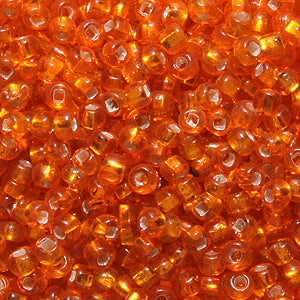 1SV999-61: Vintage Venetian Transparent Orange 10/0 1 Ounce Package