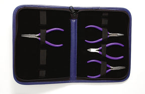 A Beaders 4 Piece Tool Set with purple handles, including various types of pliers, neatly arranged inside an open blue zippered case.