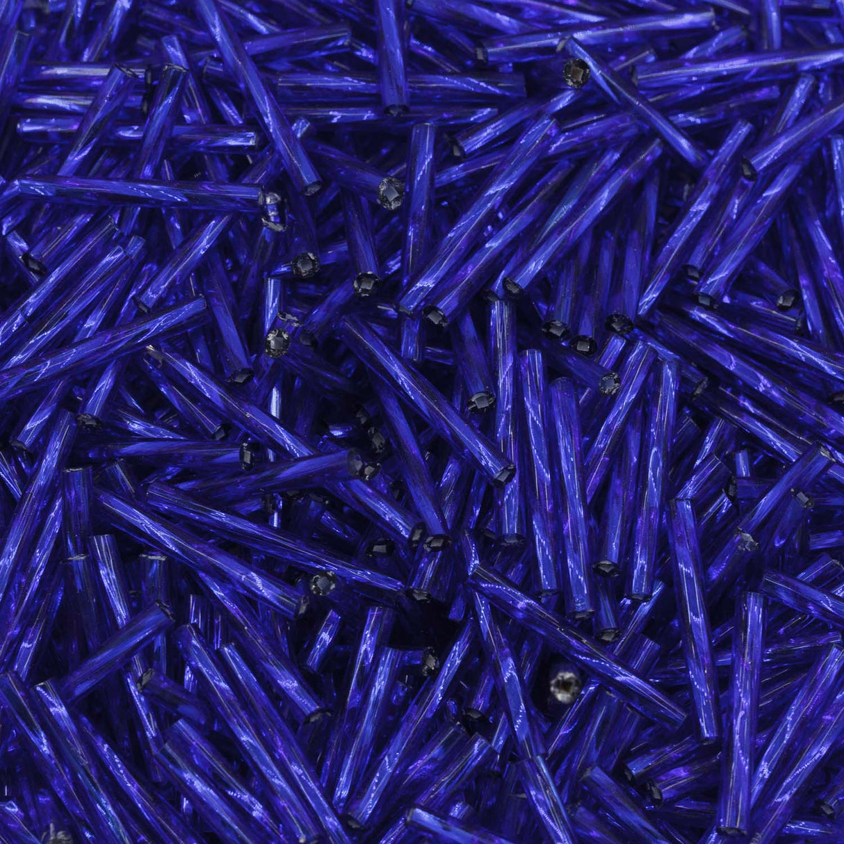 20BT476: Czech Twisted Bugle Silverlined Sapphire 20mm - 50GM