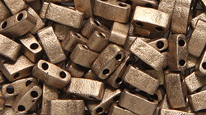 53SD853-M: Miyuki 1/2 Tila 2-H MTLLC Bronz Mat 2.3x5 10GM