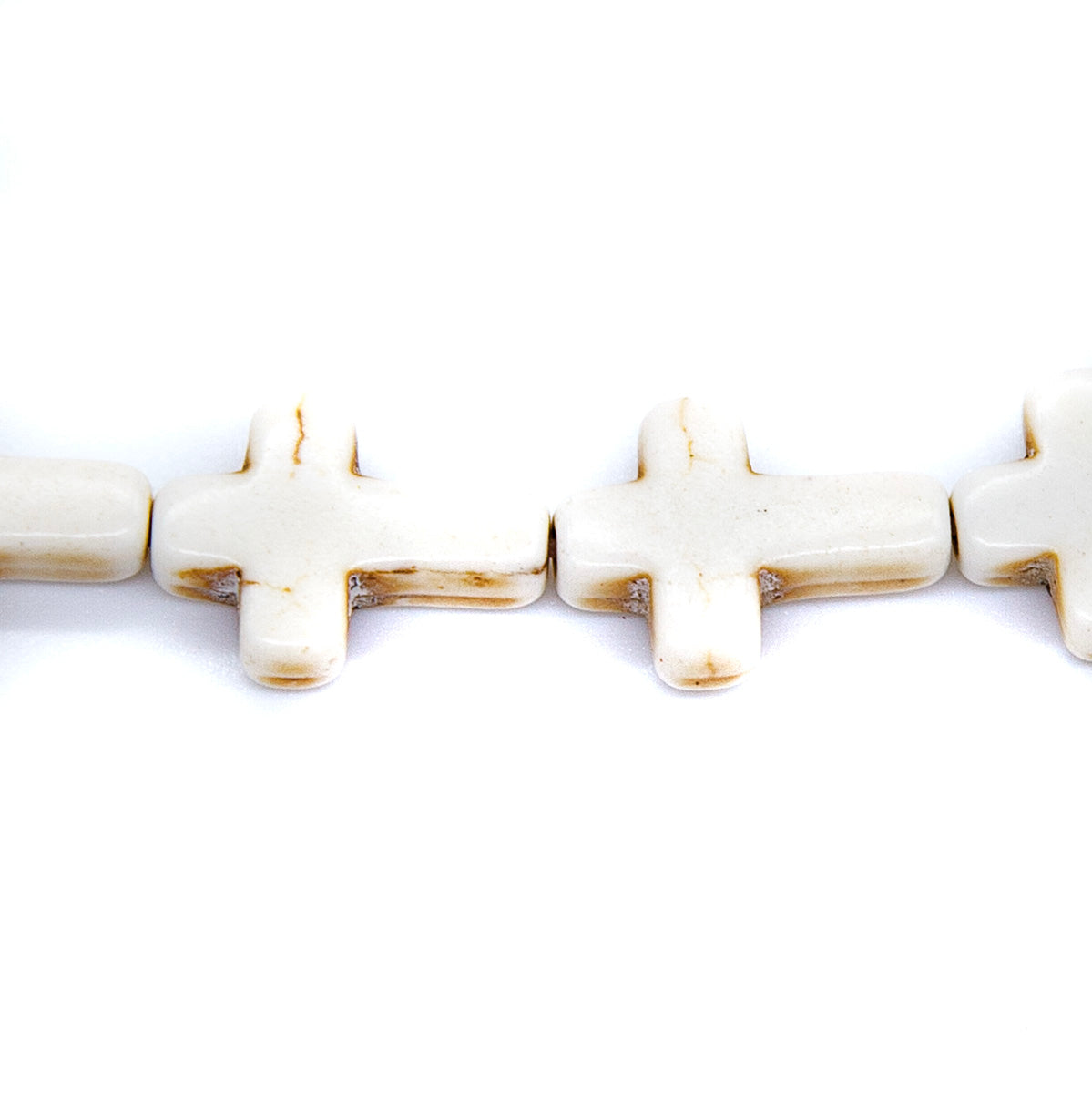 27ST612-W: Magnesite Cross Beads White 12x16mm 15.5"