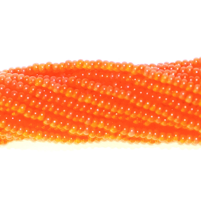 10SB934R: CZ Seed Bead Dyed Bright Orange 10/0-1HK