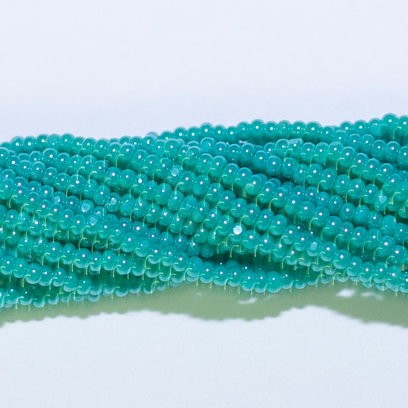 13SB385-C: CZ Seed Bead Charlotte Sfinx Turquoise Green 13/0