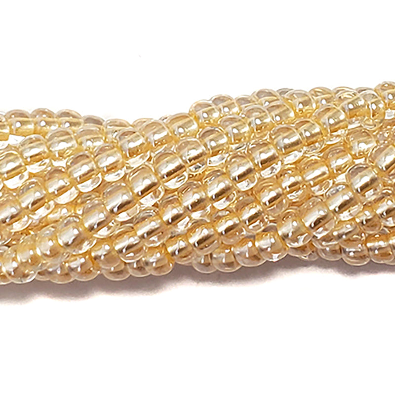 6SB652-LPR: CZ Seed Bead Pastel Pearl Lined LT Gold 6/0-6STR