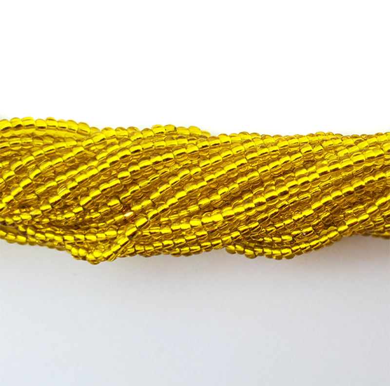11SB422-RHR: CZ Seed Bead SIL-Line Yellow #87010 Round Hole 11/0-1HK
