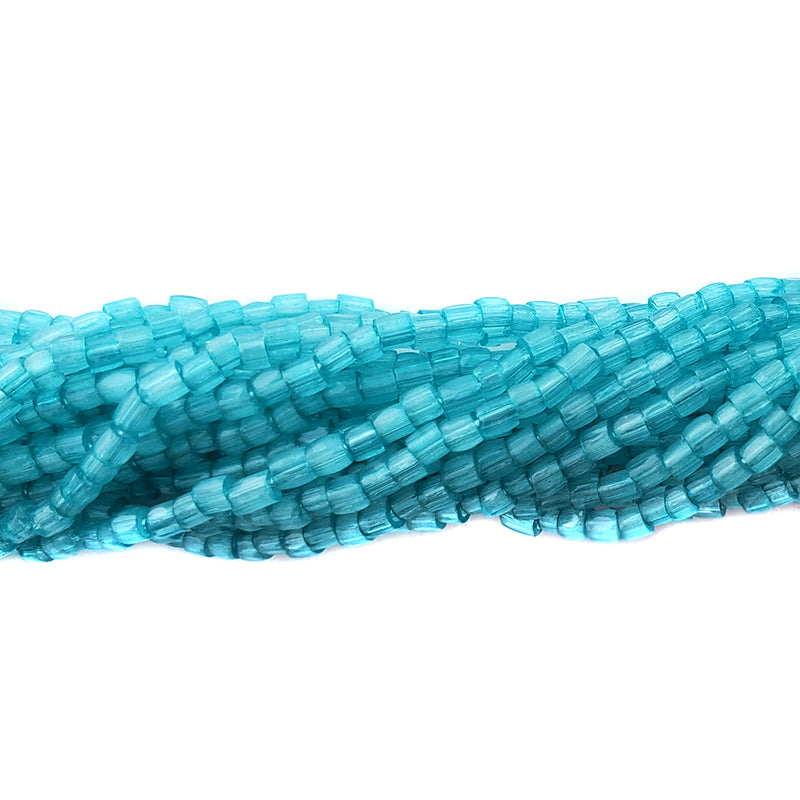 9SC985: CZ Seed Bead 3-Cut Satin Emerald Blue SolGel 9/0 5HK
