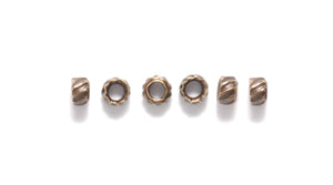 2FI160-ABR: Crimp Bead Fluted Ant Brass 2mm - 100PPK