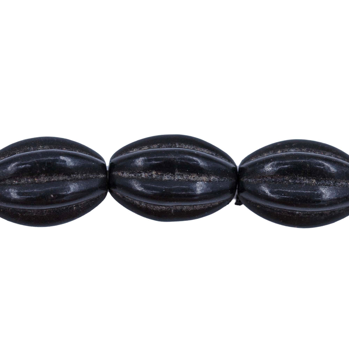 31ST612-BK: 10x14mm Black Magnesite Oval Pumpkin Beads 15.5"