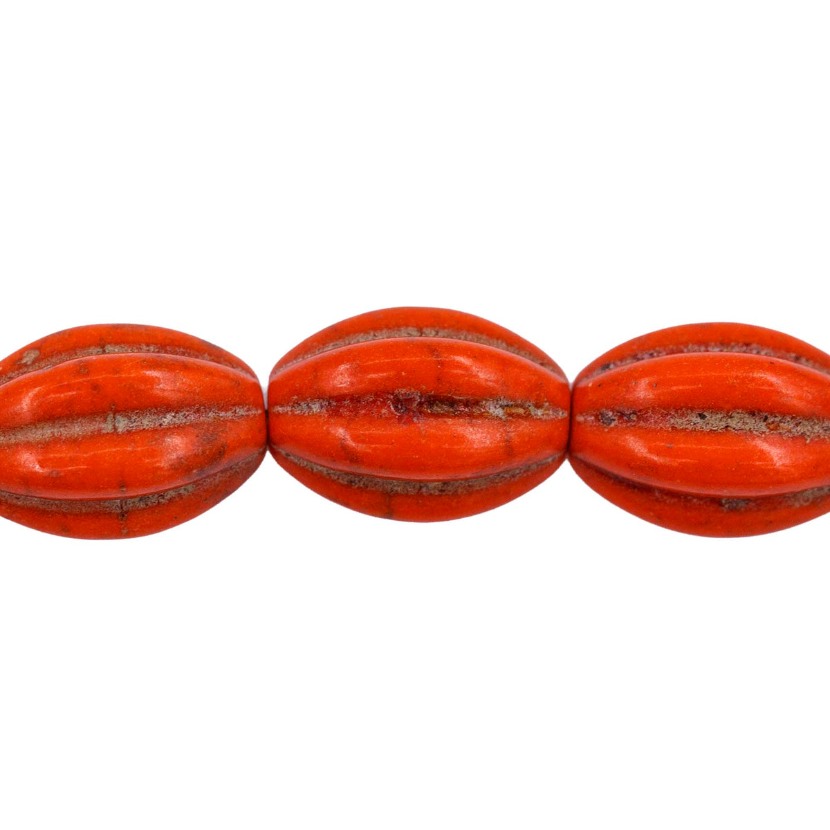 31ST612-O: 10x14mm Orange Magnesite Oval Pumpkin Beads 15.5"