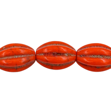 31ST612-O: 10x14mm Orange Magnesite Oval Pumpkin Beads 15.5"