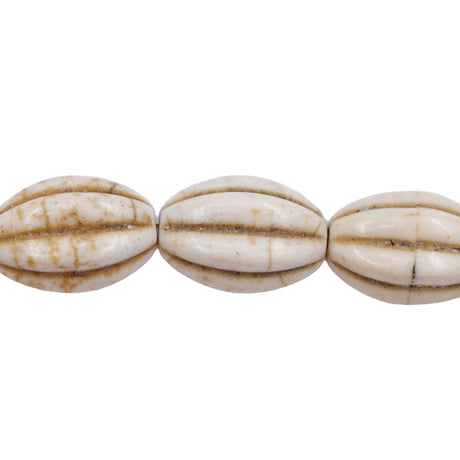 31ST612-W: 10x14mm White Magnesite Oval Pumpkin Beads 15.5"