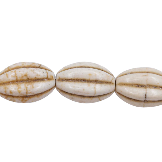 31ST612-W: 10x14mm White Magnesite Oval Pumpkin Beads 15.5"