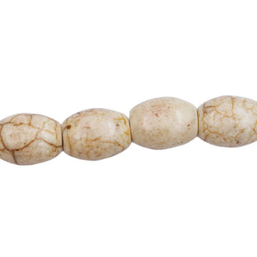 34ST612-W: Magnesite Rice Beads White 8x12mm 15.5"