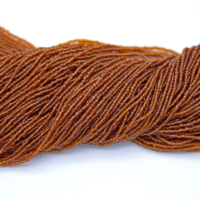 9SC256R: CZ Seed Bead 3-cut Trans Deep Topaz 9/0-1HK
