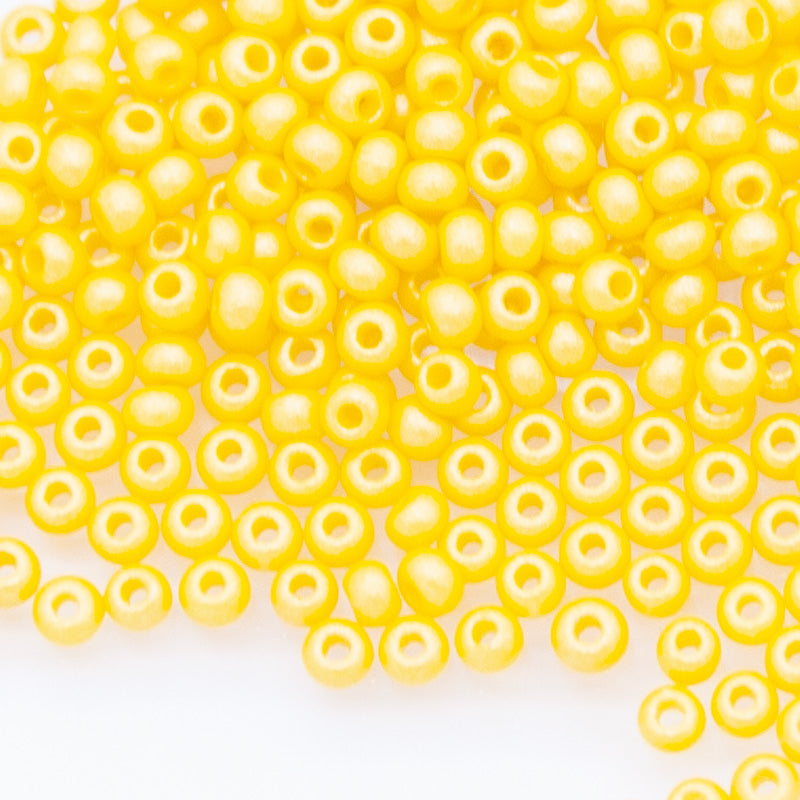 10SB925-PLR: CZ Seed Bead Permalux Dark Yellow 10/0 - 25GM