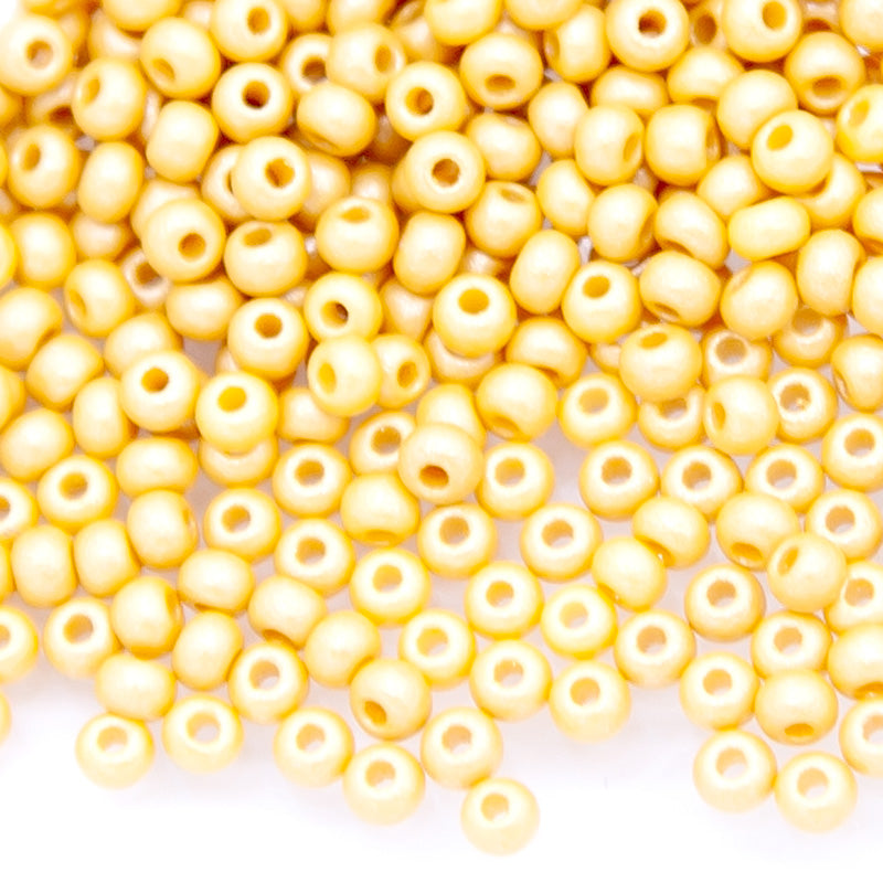 10SB928-PLR: CZ Seed Bead Permalux Yellow Brown 10/0 - 25GM