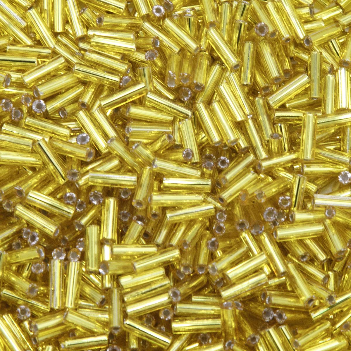3BB422-50: CZ Bugle Bead SIL Line Yellow Round Hole #3-50GM