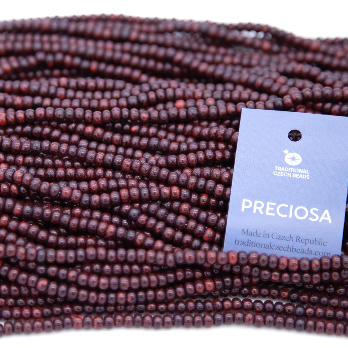 6SB144-52: CZ Seed Bead Opaque Red with Travertine 6/0 36STR