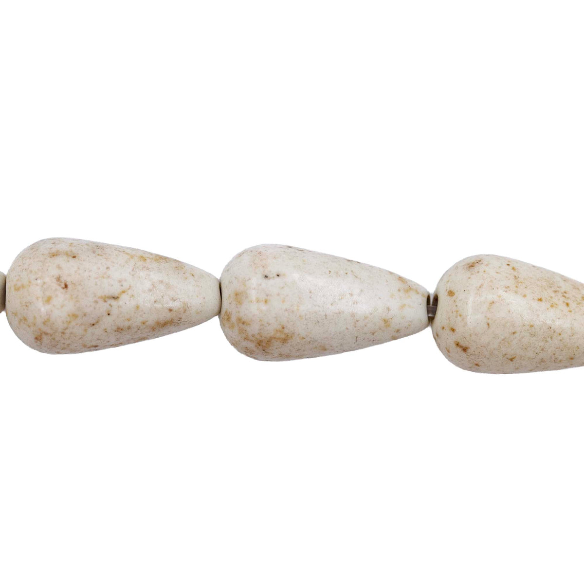 44ST612-W: Magnesite Tear Drop Beads White 8x15mm 15.5"