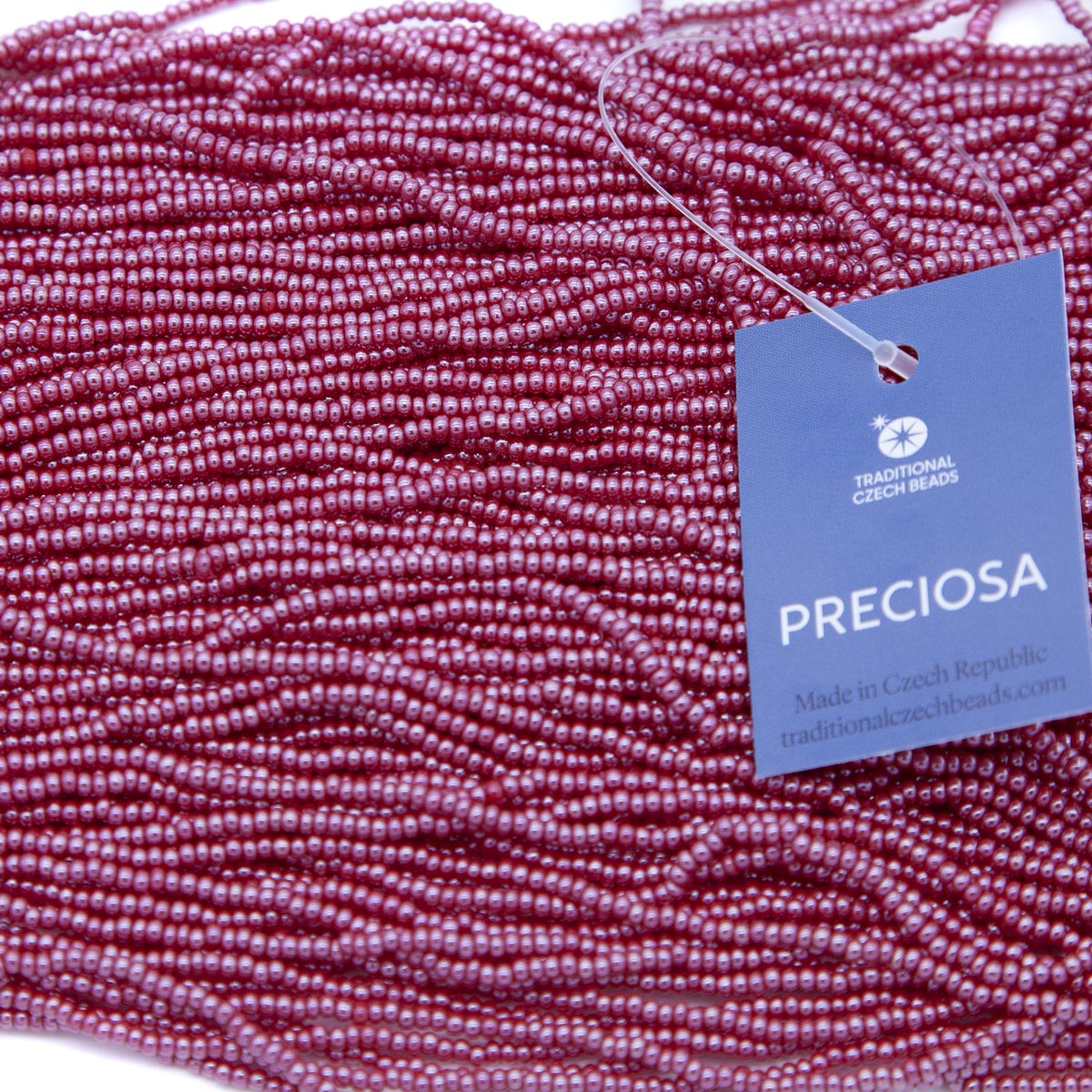 11SB346:  CZ Seed Bead Sfinx Dark Red 11/0 - 6HK