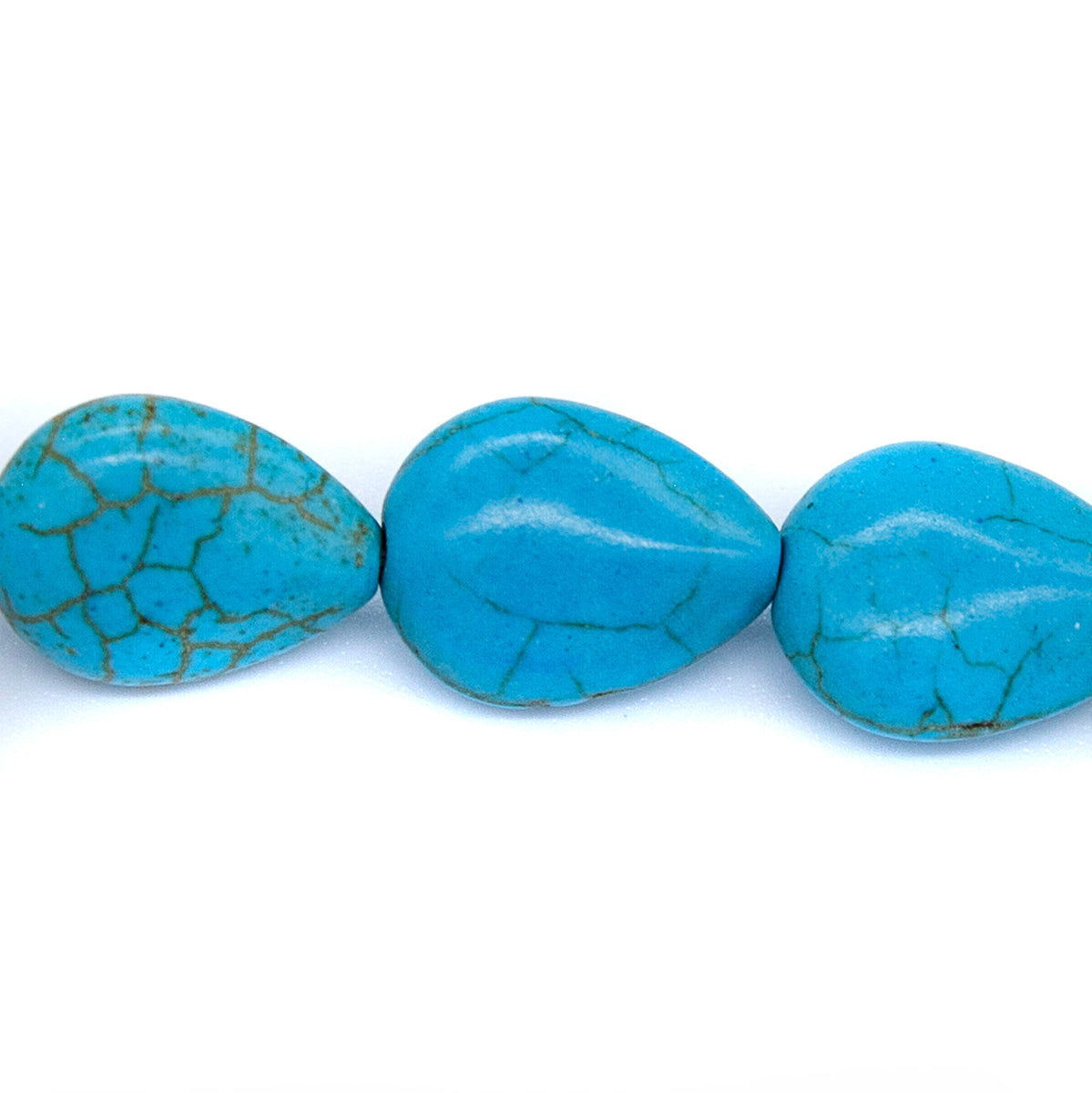 46ST612-B: Magnesite Pear Drop Beads Turq Blue 12X16mm 15.5"