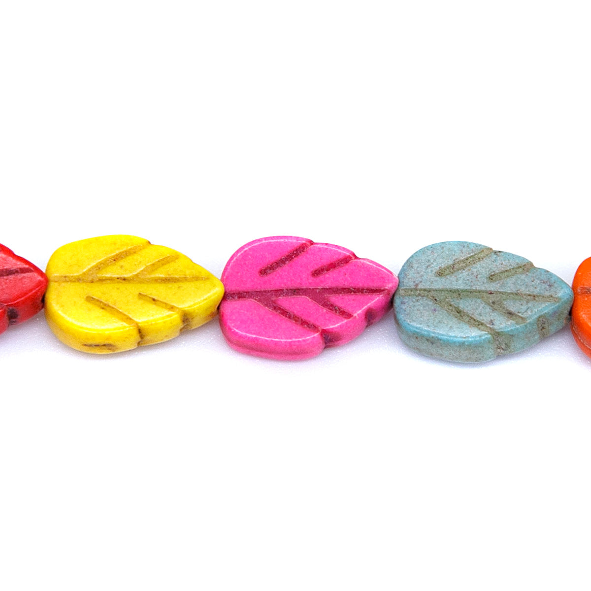 47ST612-X: Magnesite Leaf Beads Mix 8x12mm 15.5"