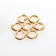 4FI206-G: Jump Ring Steel 4mm 18GA GLD PLT - 55PC/5GM
