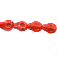 4ST50-O: 8x7mm Orange Magnesite Skull Beads 15.5"