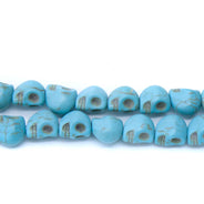 2ST50-B: Skull Magnesite Turquoise Blue 8x10mm