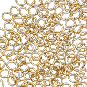 5FI223-G: USA Made Brass Oval Jump Ring Gold Finish 4.7x5.8mm 18 Gauge 25 Gram