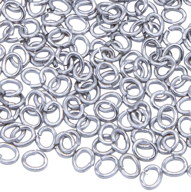 5FI223-IRR: USA Made Brass Oval Jump Ring Imitation Rhodium Finish 4.7x5.8mm 18 Gauge 5 Gram