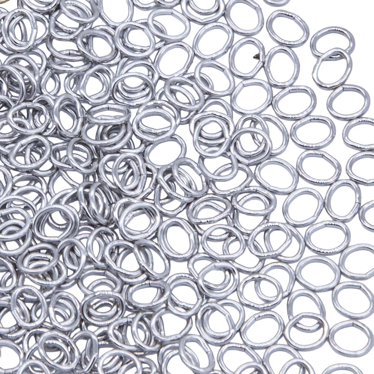 5FI224-IRR: USA Made Brass Oval Jump Ring Imitation Rhodium Finish 4.4x5.2mm 21 Gauge 5 Gram